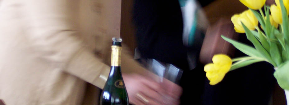 dealing out the bubbly; photo